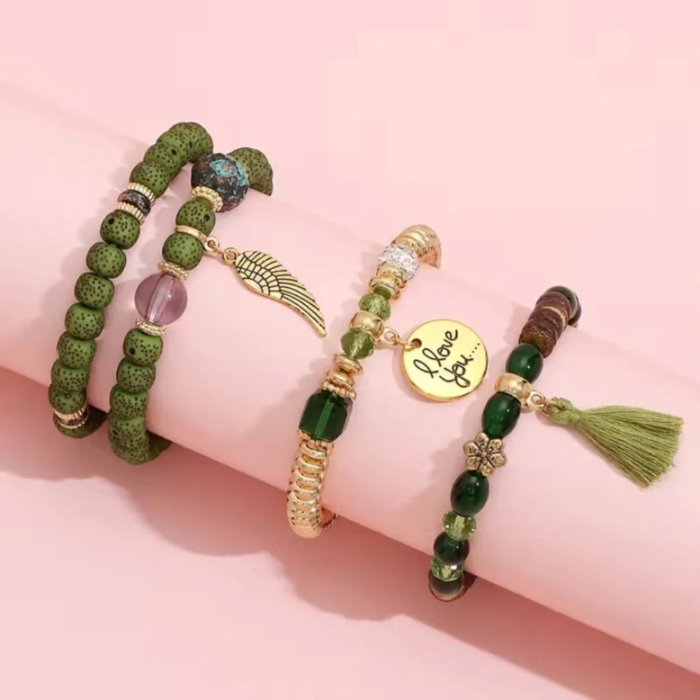 Green tassel and wing charm beaded‎ bracelet set